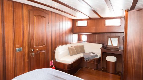 Enjoy the comfort of the spacious cabin with its own seating area on Gulet Primadonna.